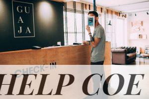man standing beside counter