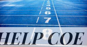 Blue athletic running track with numbered lanes, ideal for sports events and race preparations.