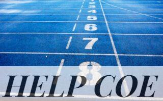 Blue athletic running track with numbered lanes, ideal for sports events and race preparations.