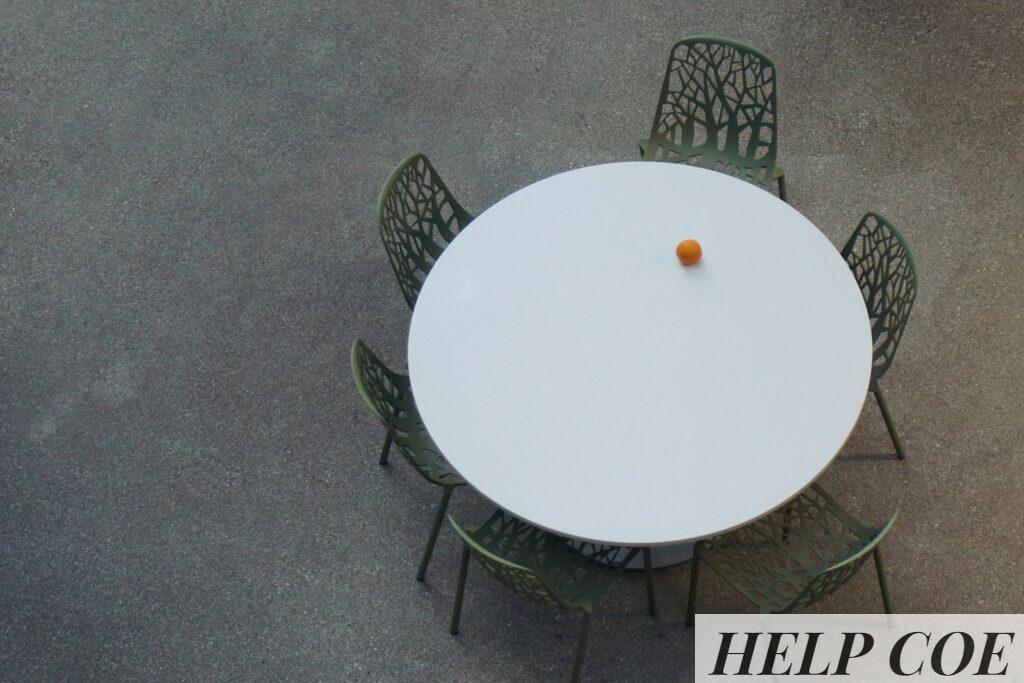 an overhead view of a table and chairs