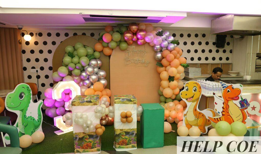 Dinosaur themed birthday party decorations with balloons
